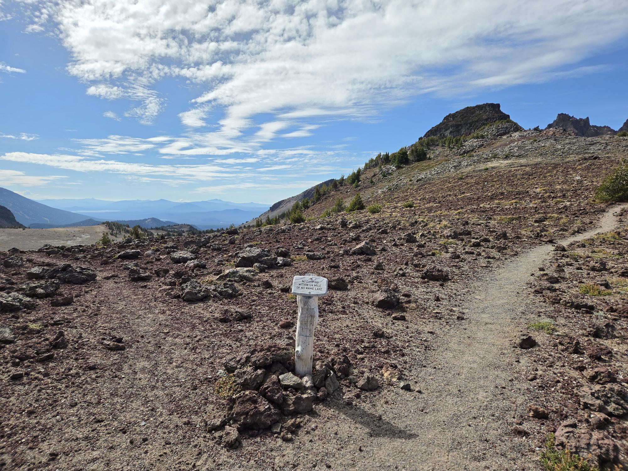 The faint unmaintained trail around Broken Hand was visible but required attention to follow.
