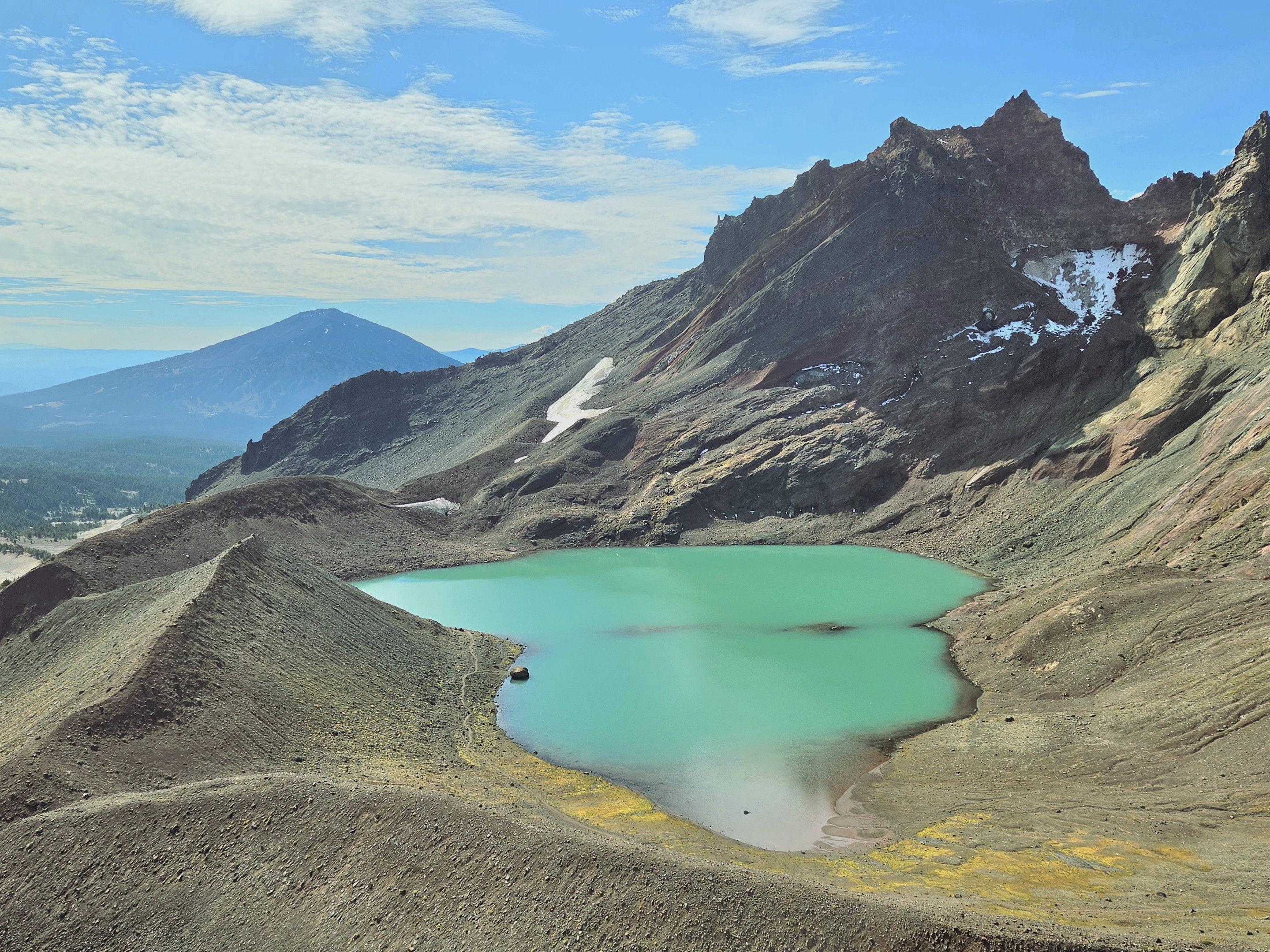 Our favorite lunch spot looks down on No Name Lake and across the Broken Top basin.